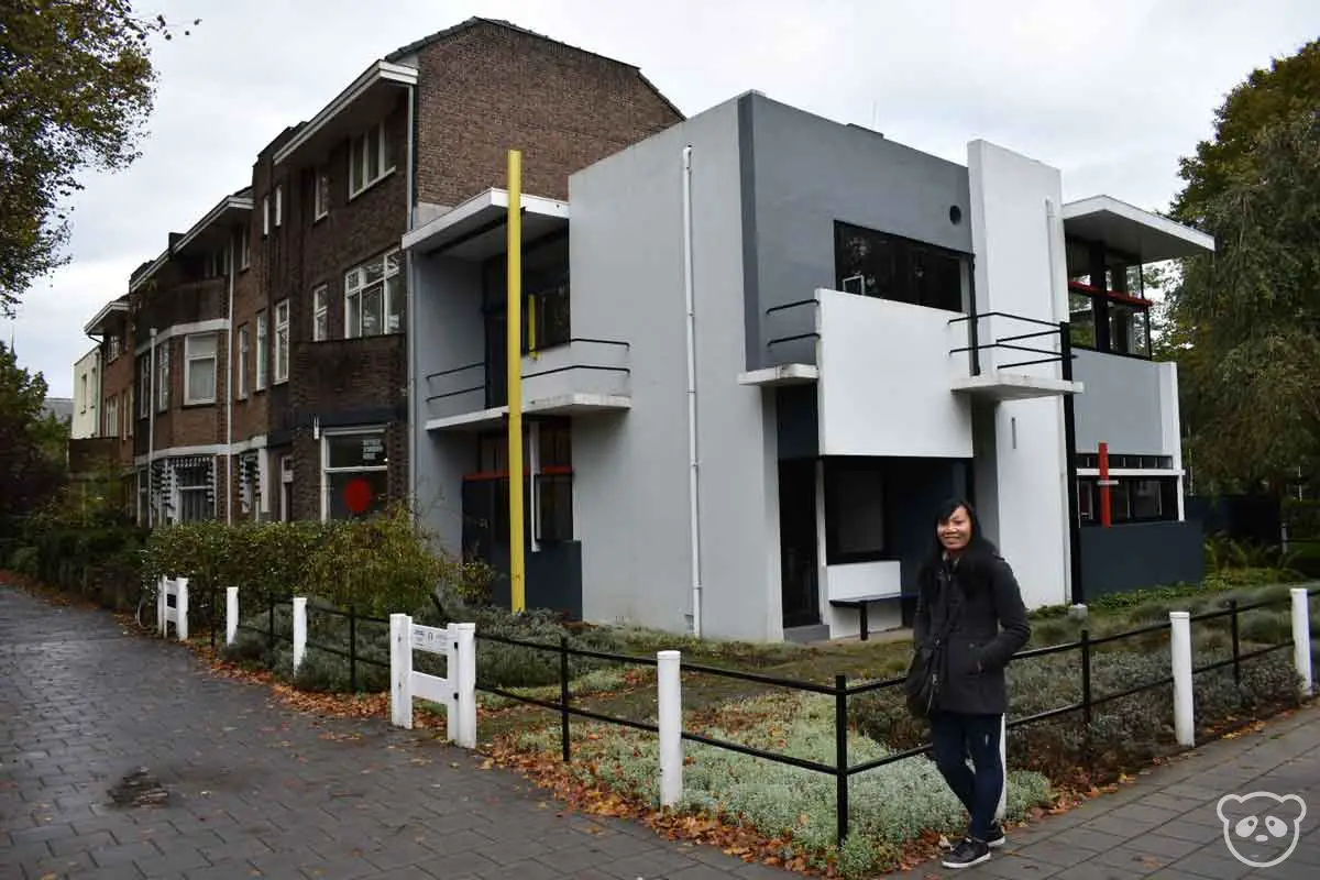 Rietveld Schroder House from the sidewalk with Constance in the photo.