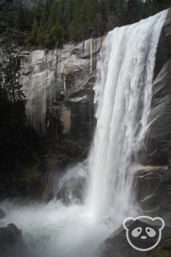 strong waterfall gushing from the mountain.