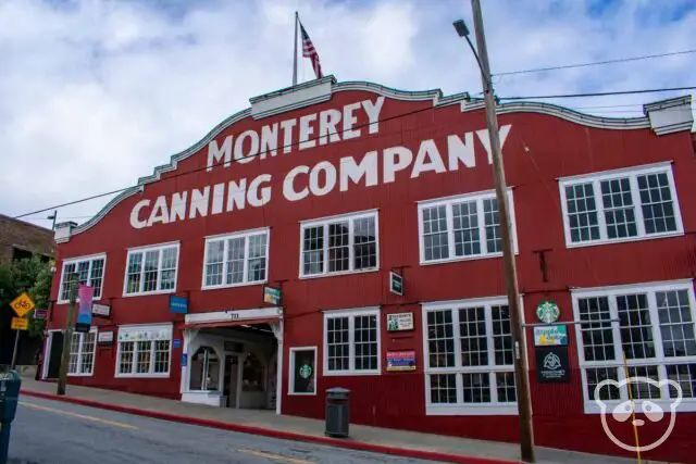 Historic red building with American flag at the top. 