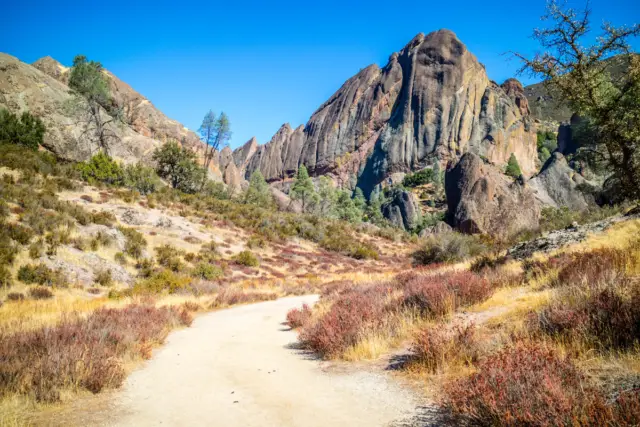 Hiking trail leading to the rock formations in the background