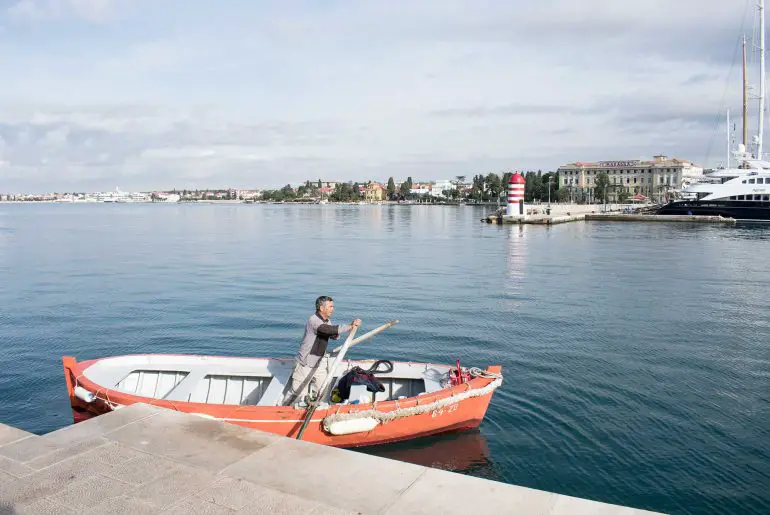 Boatmen of Zadar in Croatia: Take a Ride for a Unique Local Experience zadar-boat-pulling-into-stop