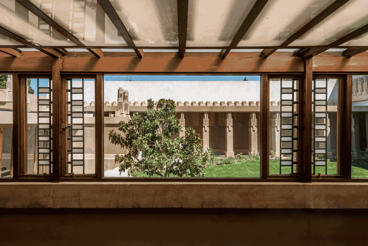 View of the courtyard out the window from another room inside. 