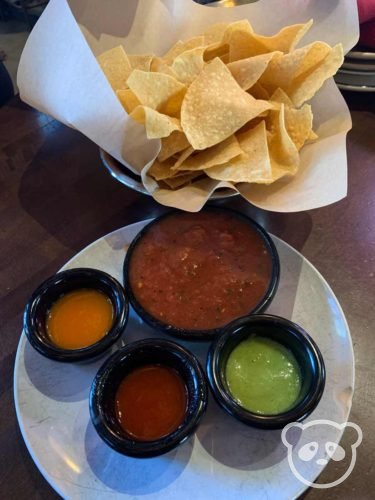 Tortilla chips with 4 different salsas.