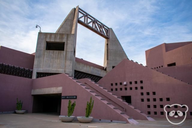 ASU Art Museum back entrance with potted cacti plants in front. 