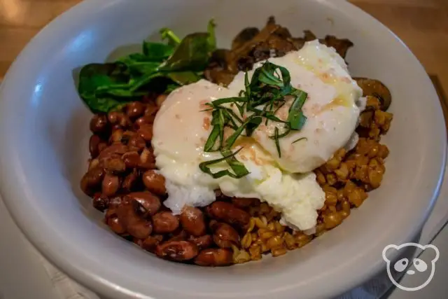 Bowl of spinach, Anasazi beans, farro, and poached eggs. 