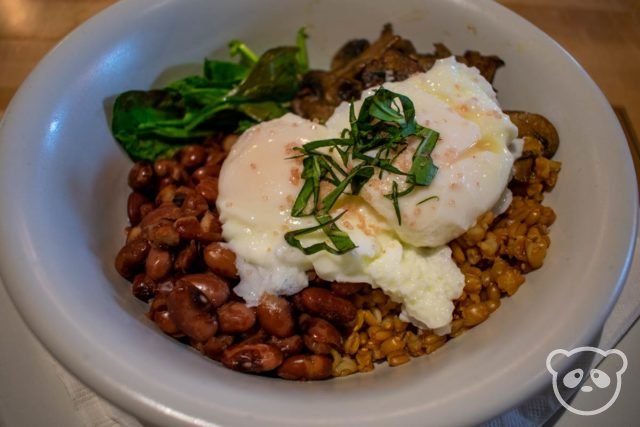 Bowl of spinach, Anasazi beans, farro, and poached eggs.
