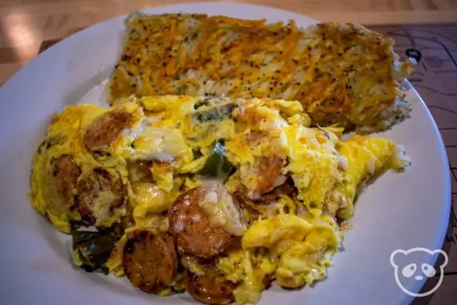 Sausage, spinach, scramble with a side of hashbrowns.