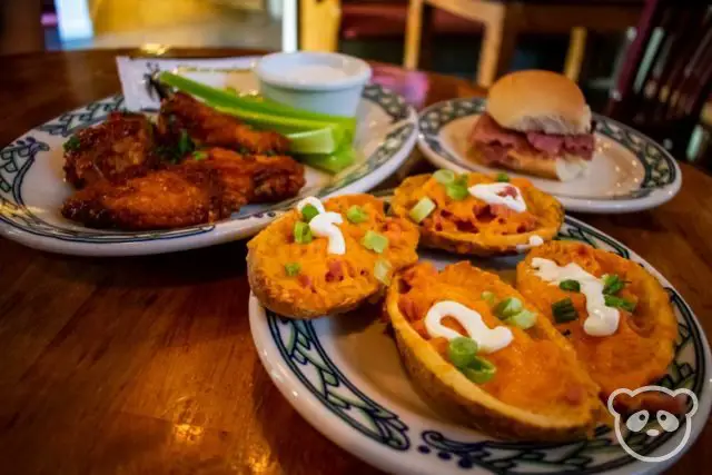 BBQ chicken wings, potato skins, and corned beef slider from Rula Bula Irish Pub.