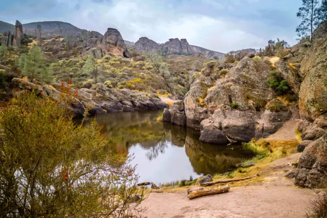 Pond in between rocky formations 